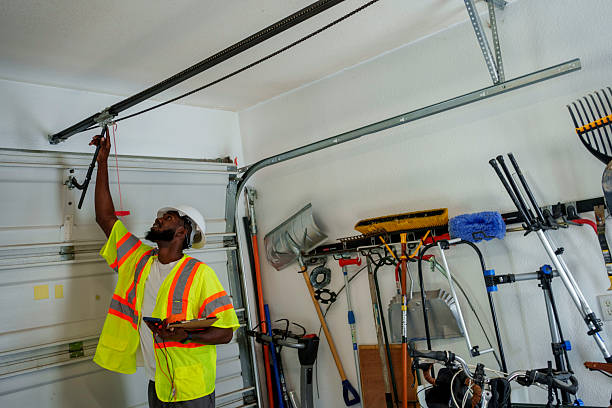 Professional Garage Door Panel Replacement technician working in Madison County County, TX